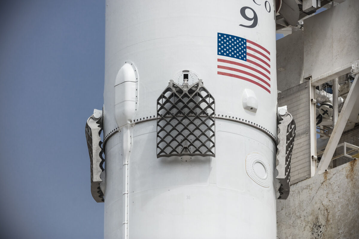 Titanium grid fins on a Falcon 9 booster